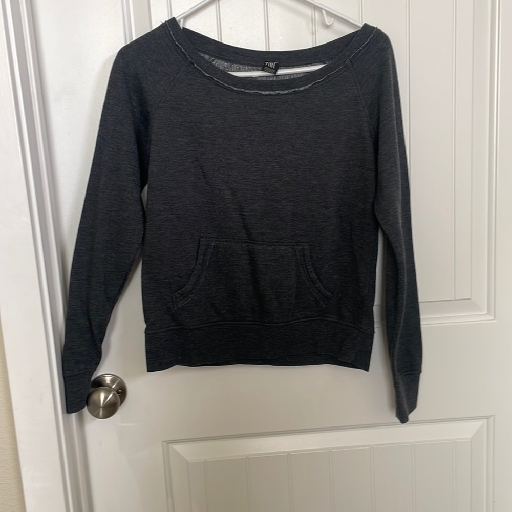 Zine. Size small. Scoop neck pullover. Good condition.